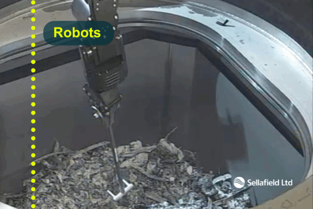 Robotic arms within the Pile Fuel Cladding Silo