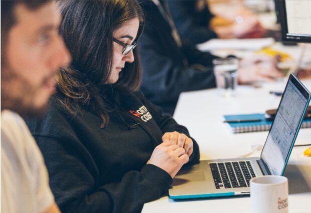 A Northcoders student looks at a computer screen