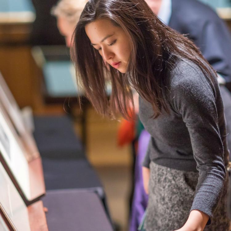 Woman browsing prints and drawings