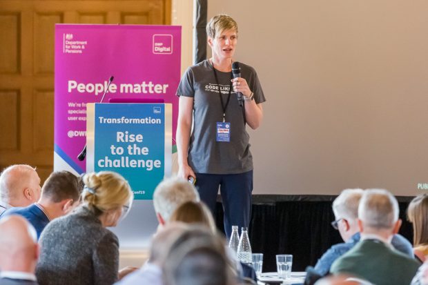 Helen Roberts speaking in front of a room of people