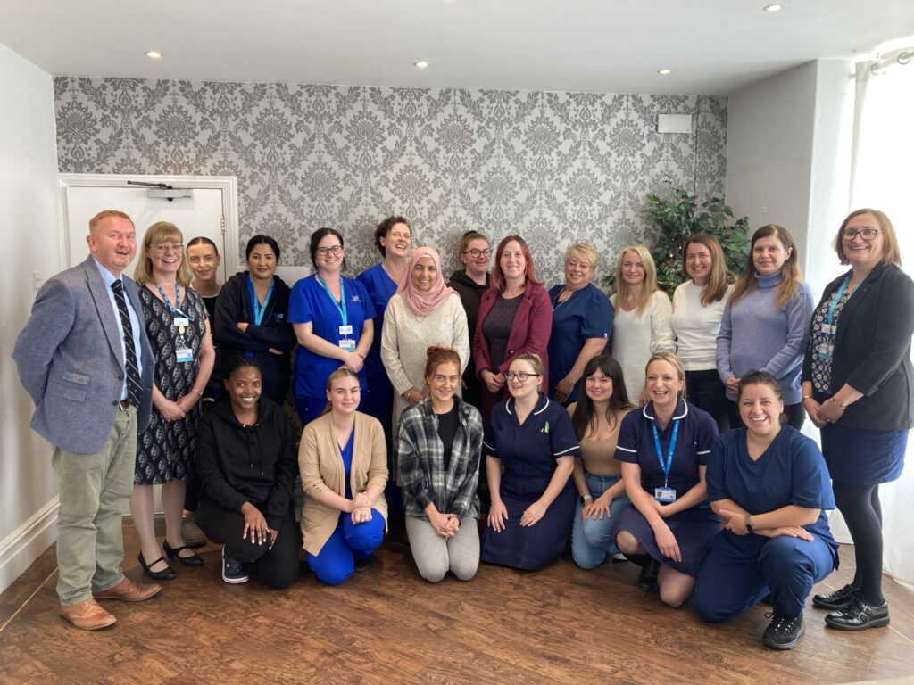 Professor Jamie Waterall poses with the Staffordshire Training Hub for General Practice Nurses