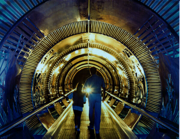 2 people working through a tunnel into Sellafield Visitors' Centre