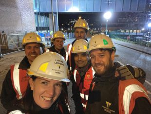 People wearing hardhats on a construction site