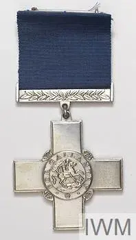 medal, ribbon, brooch bar and fitted case of issue plain Greek cross (arms of equal length) in silver (46mm wide by 50mm height). On the obverse, St George (on horseback) and the dragon within a central raised roundel surrounded by a band bearing the text 'FOR GALLANTRY' , 