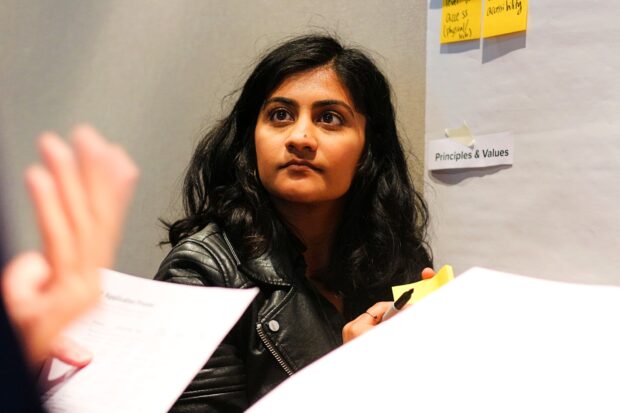A photo of a person designing a public service.