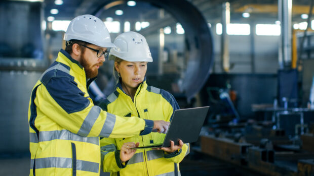 Male and female construction workers