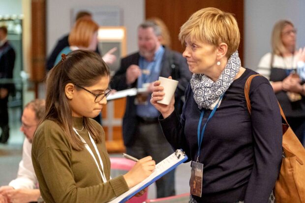 People taking part in an event about public services.