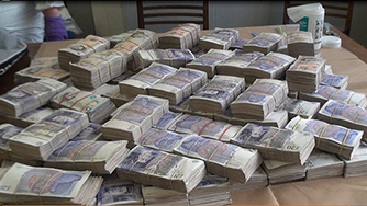 Stacks of cash laid out