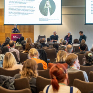 A photo of the conference event.