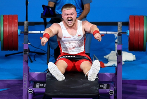 Para powerlifter Mark Swan celebrates a successful lift
