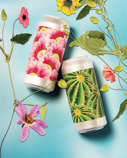 Beer cans layed out with flowers