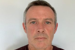 Portrait image of Adam Jackson