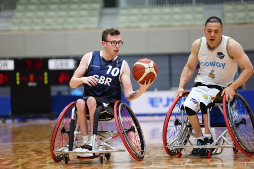 Wheelchair basketball player James Hazell competes in an international match for Great Britain against South Korea