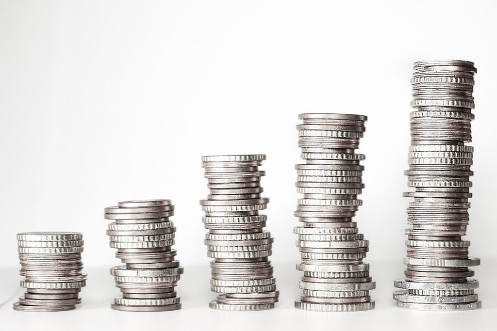 Stacks of silver coins increasing in height