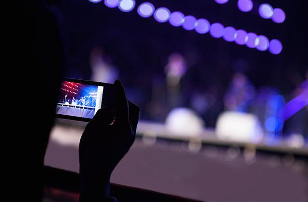 Image of a mobile phone taking a photograph.