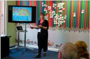 A presenter speaking at the event
