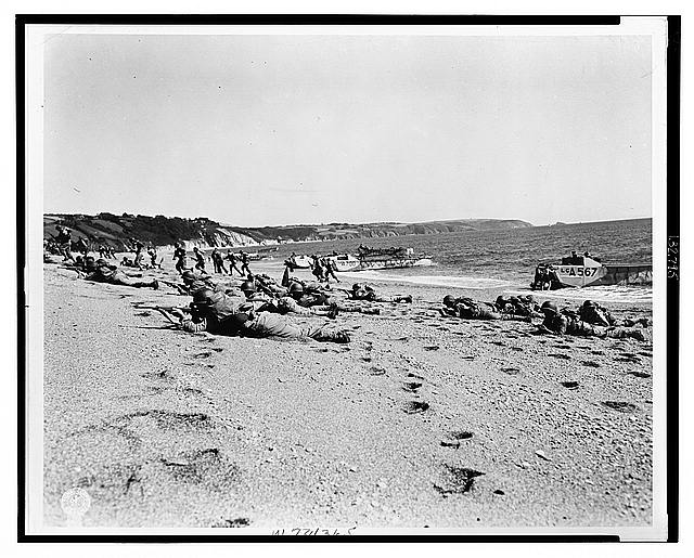 The beach of Slaptom Sand, Soldiers laying on the beach and foot prints of other people's tracks