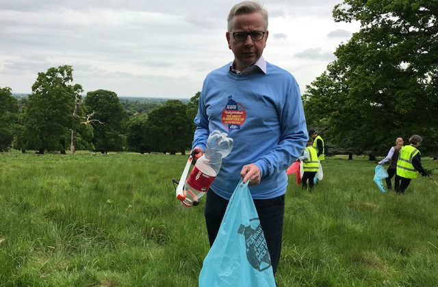 Michael Gove picking litter