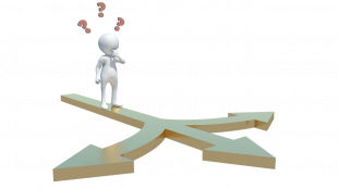 An individual standing at cross roads deciding which path to take