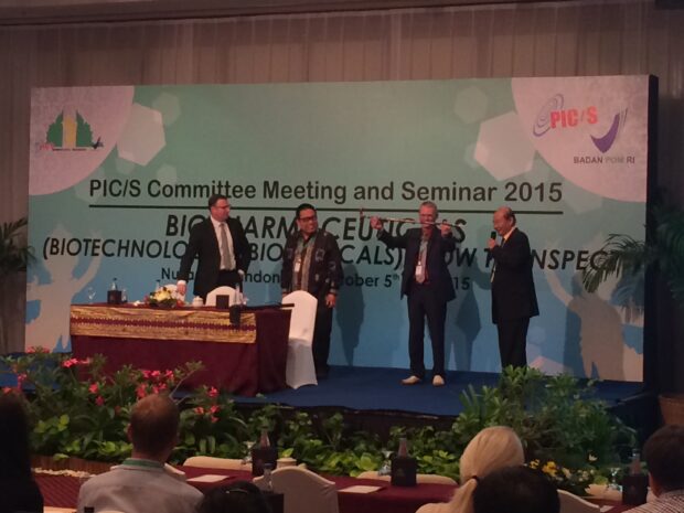Paul Hargreaves, MHRA, UK receives the PIC/S walking stick in Indonesia