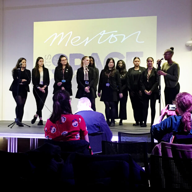 Photo of a group of young women on stage
