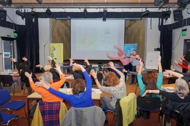 Audience participation - a sea of waving arms. Photo credit: Strong Island Media