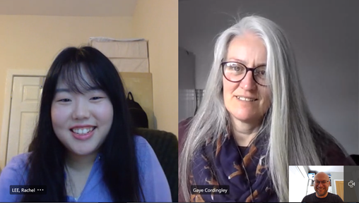 Two women and a man on a video call together