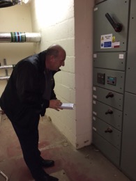 Watching the clocks - Stephen Mead, ITC checking meter readings.