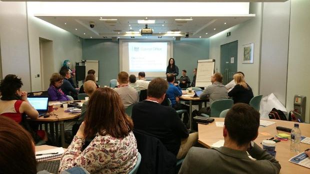 GDS speaker talking at the Digital by Default Assessment