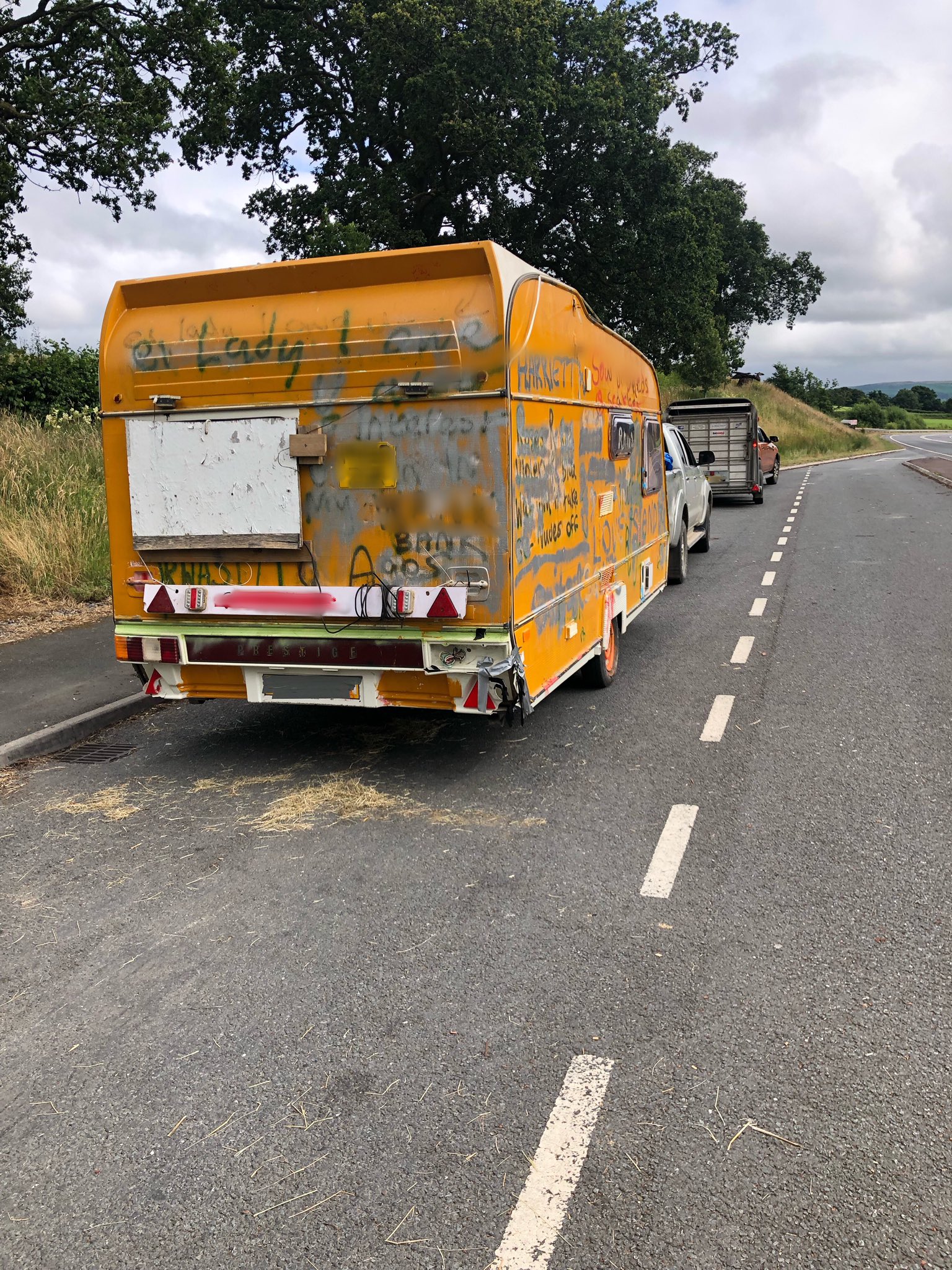 Caravan with graffiti and in poor condition