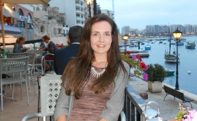 Stacey Phillips, Digital, Data and Technology Fast Streamer, sitting in a cafe next to the water