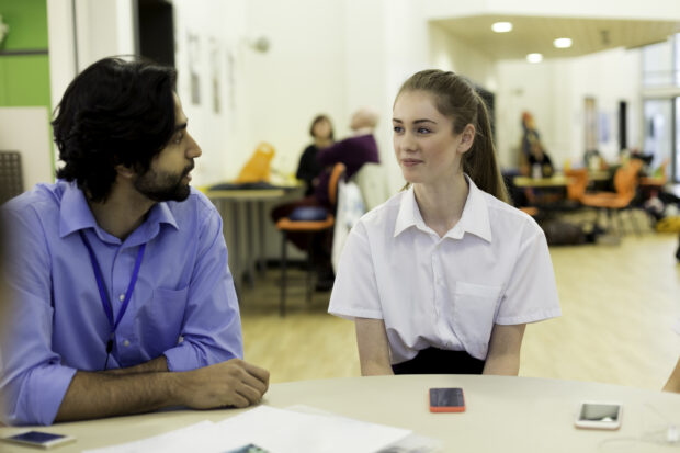 Teacher and student in discussion