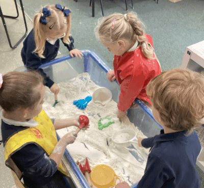 Pupils playing sand