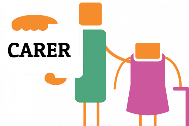 A carer holding up a card with the word 'carer' on it - like a means of identification