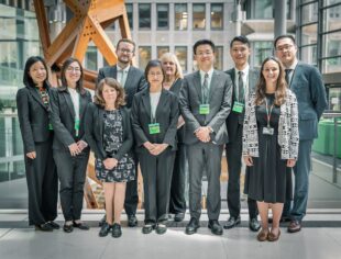 HMCTS staff and representatives of the Taiwanese judiciary pose for a photo together.