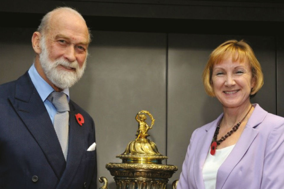 HRH Prince Michael of Kent presents the Threlford Memorial Cup to GCHQ’s Language Outreach Coordinator.