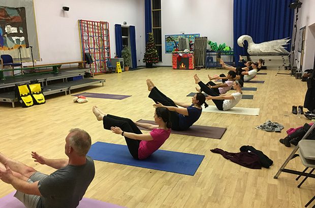 People taking part in an exercise class.