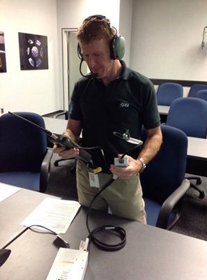 Tim training using a replica Amateur Radio.