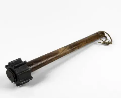 A British trench club sometimes referred to as a 'knobkerry'.