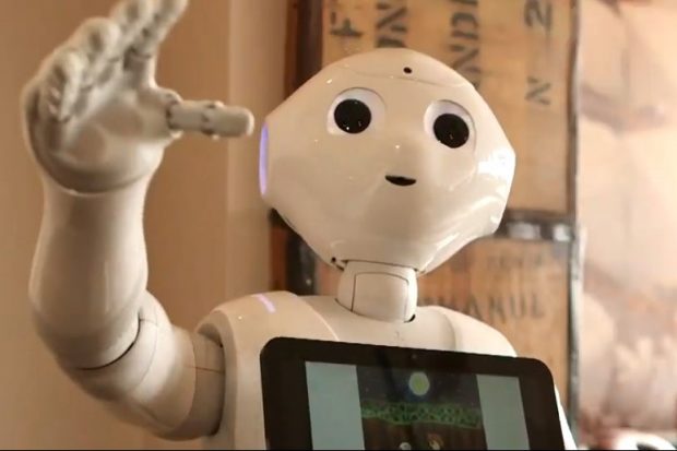 Photo of Pepper the Robot - an interactive robotic tool used to help encourage communication among those with autism and Aspergers
