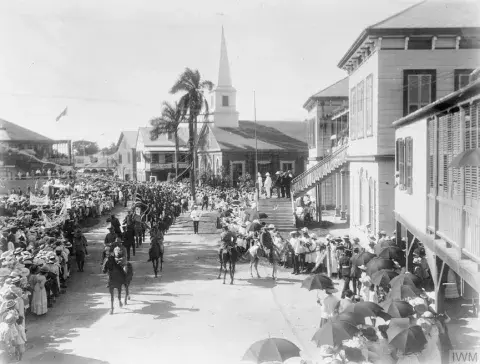 Recruiting and Training in the West Indies: Jamaica: A contingent of West Indian troops marching through Kingston, Jamaica on the way to the harbour, 1916.