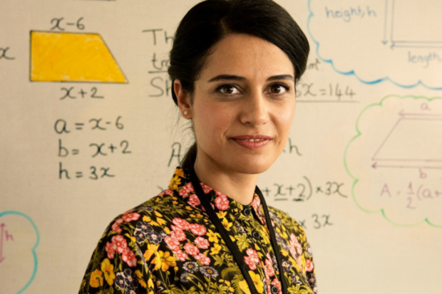 photo of teacher at front of classroom