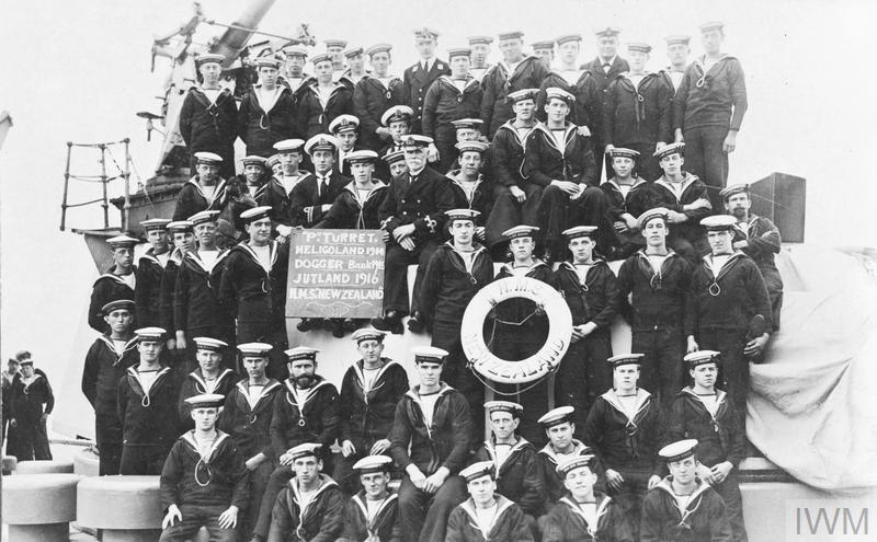 The gun crew of "P" turret of the battlecruiser HMS New Zealand posing for a group portrait after the Battle of Jutland. 