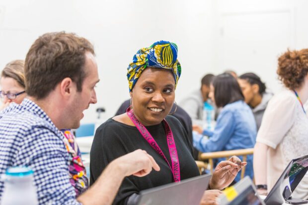 A photo of people participating in an event about public services