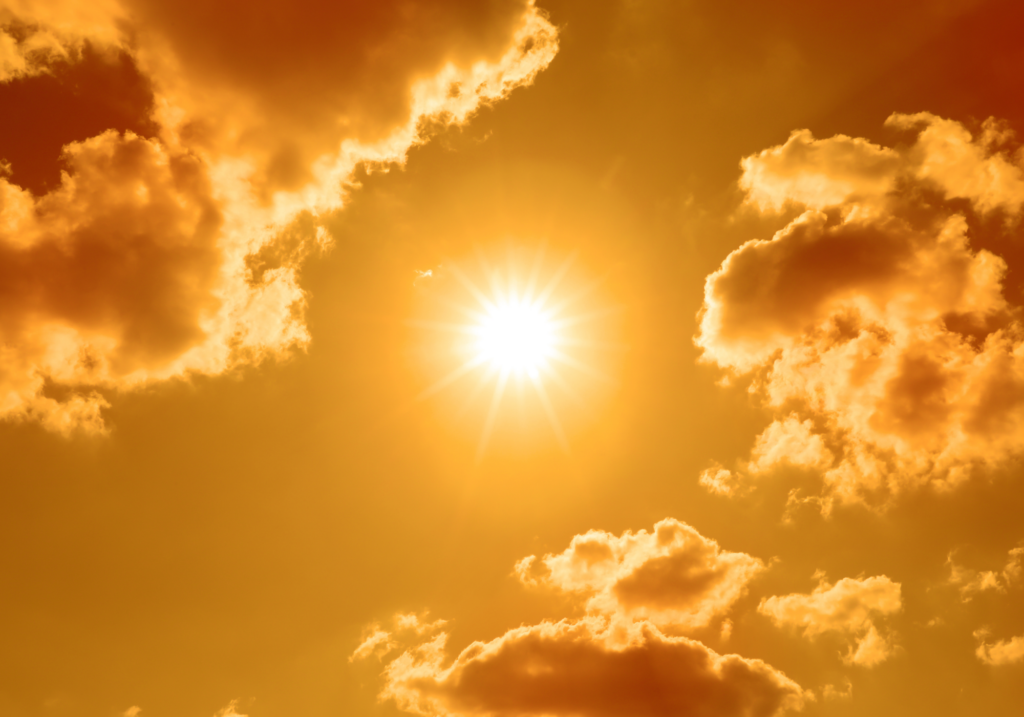 An orange sky, with a blaring sun.