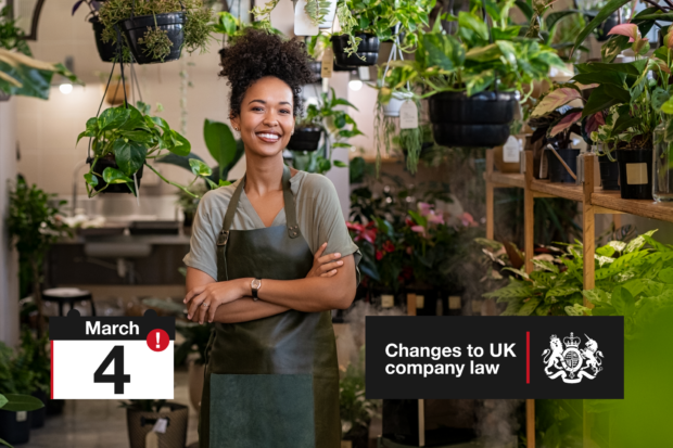Small business owner, surrounded by plants in her shop
