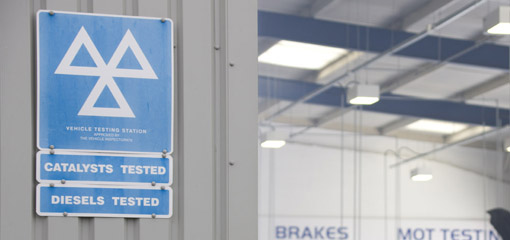 MOT testing station logo on wall