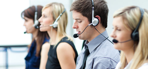 call centre operators, using microphone headsets