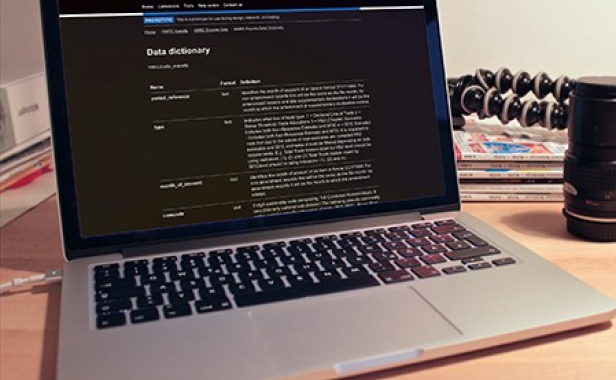 A laptop with white text on a black background.