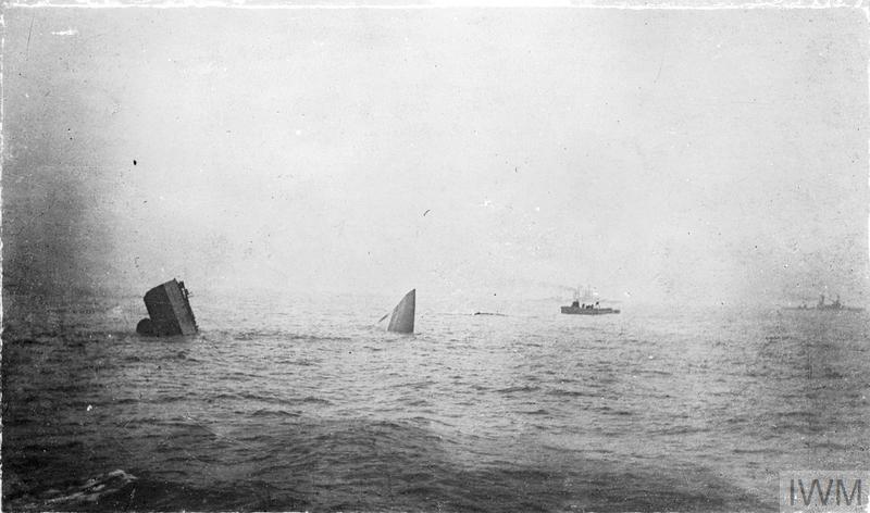 The bow and stern of HMS Invincible sticking out of the water as the battlecruiser sinks during the battle of Jutland. 